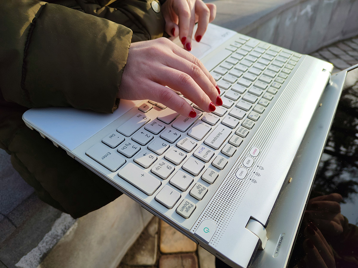 typing on a laptop